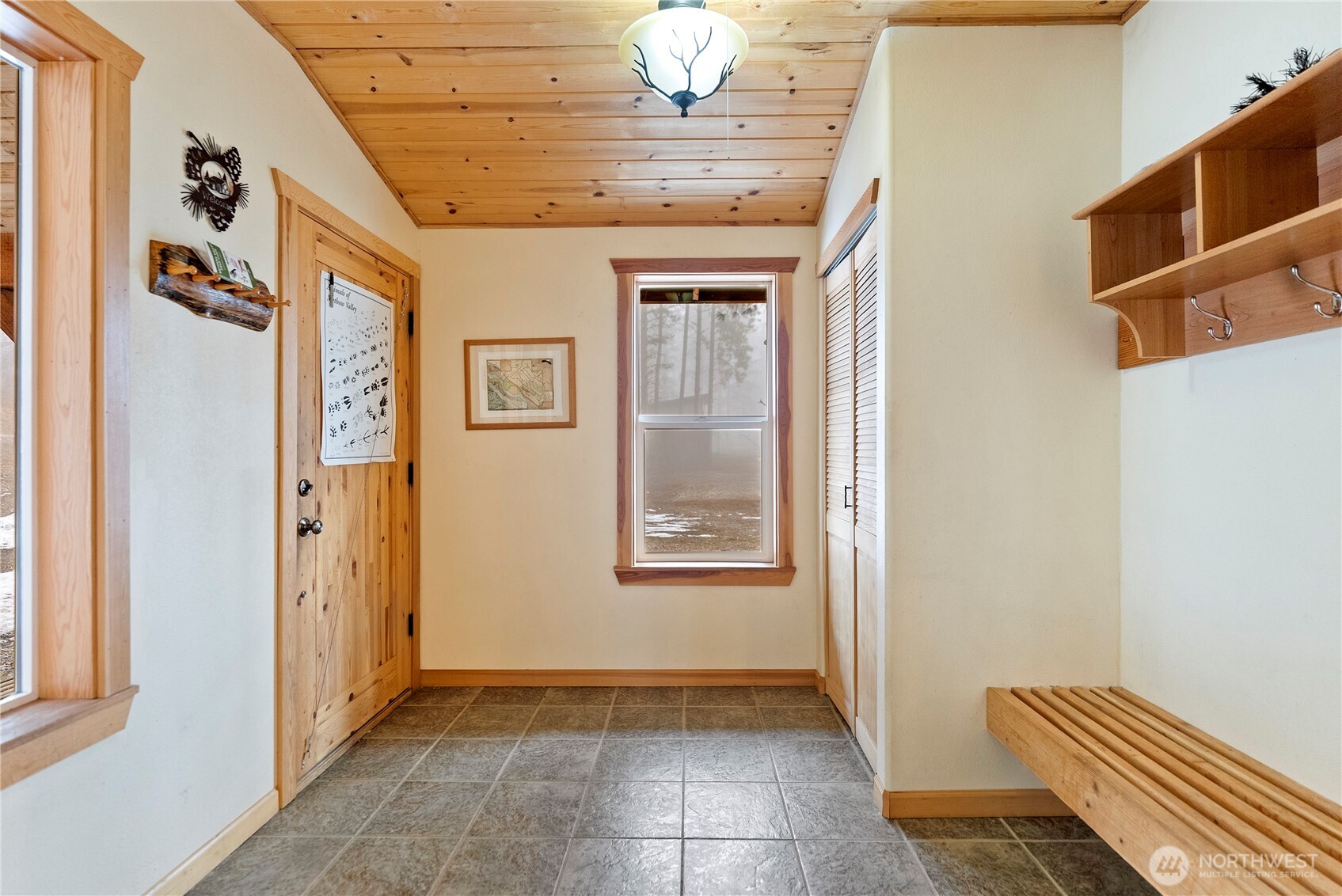 80 Homestead Road Winthrop, WA 98862 - Photo 8 of 40 a view of an entryway with wooden floor