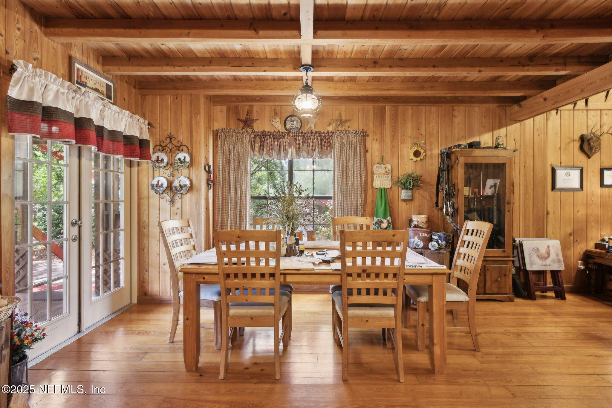 37334 Alice Street Hilliard, FL 32046 - Photo 19 of 80 a view of a dining room with furniture window and wooden floor
