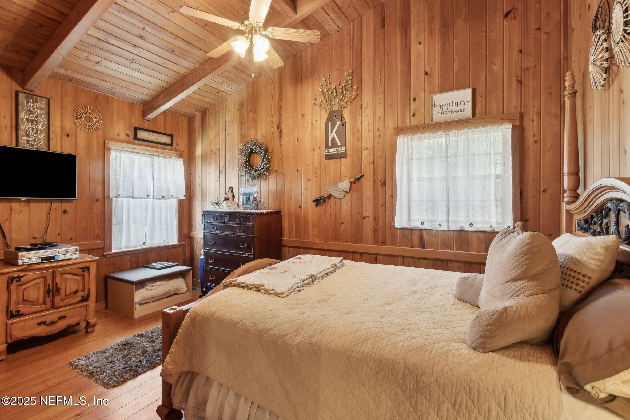 37334 Alice Street Hilliard, FL 32046 - Photo 31 of 80 a bedroom with a bed and a television
