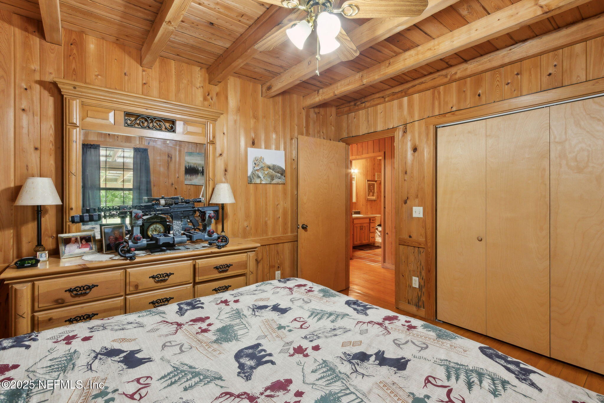 37334 Alice Street Hilliard, FL 32046 - Photo 36 of 80 a bedroom with a large bed and a dresser
