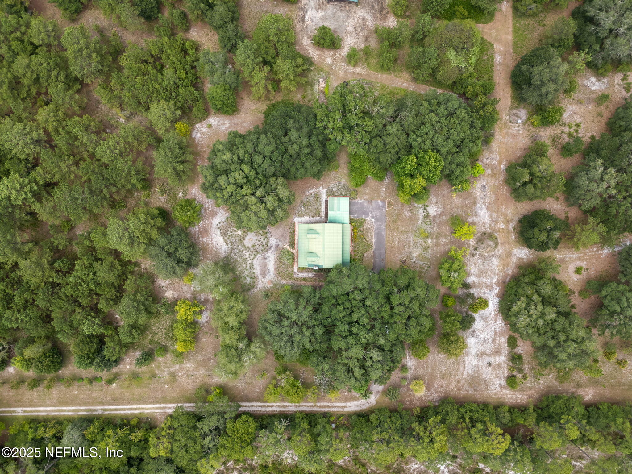 37334 Alice Street Hilliard, FL 32046 - Photo 64 of 80 an aerial view of a house with a yard