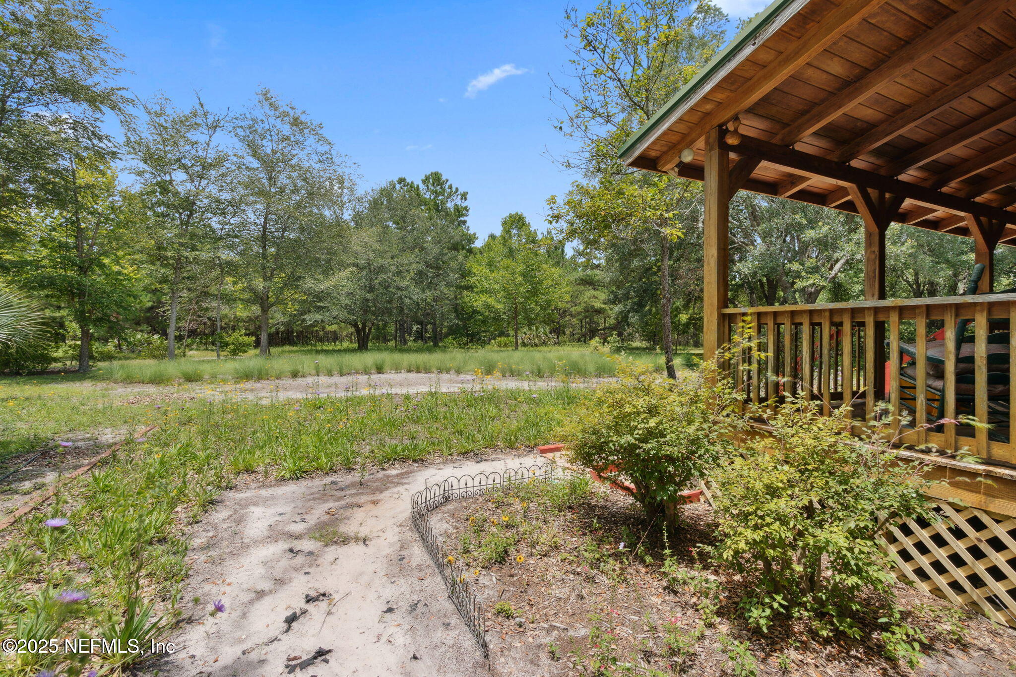 37334 Alice Street Hilliard, FL 32046 - Photo 9 of 80 a view of a backyard with sitting area