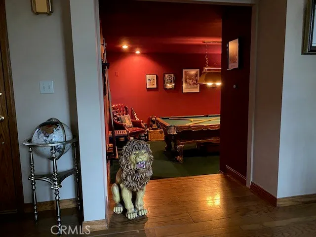 a view of a livingroom with furniture and staircase