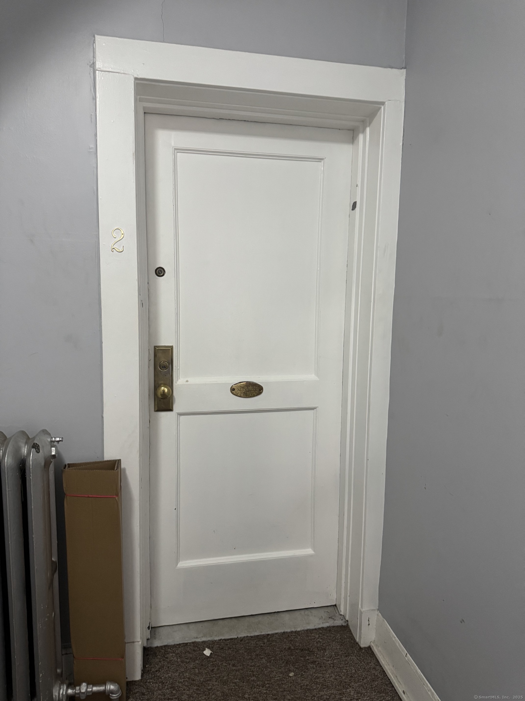 785 Connecticut Avenue, Unit 2 Bridgeport, CT 06607 - Photo 2 of 9 a view of cupboard