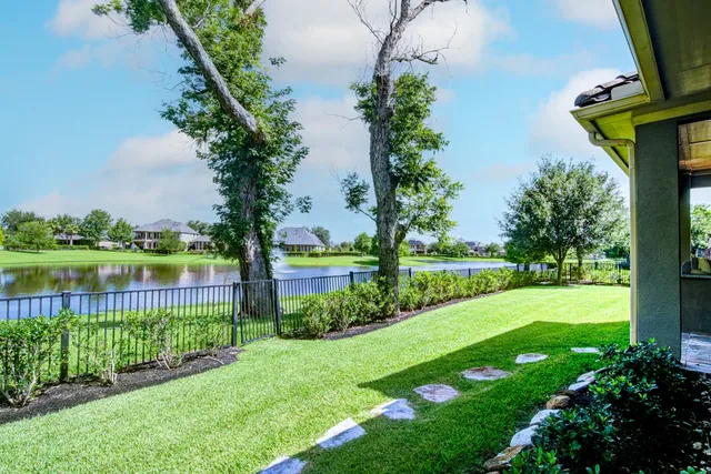 a view of a garden with a lake
