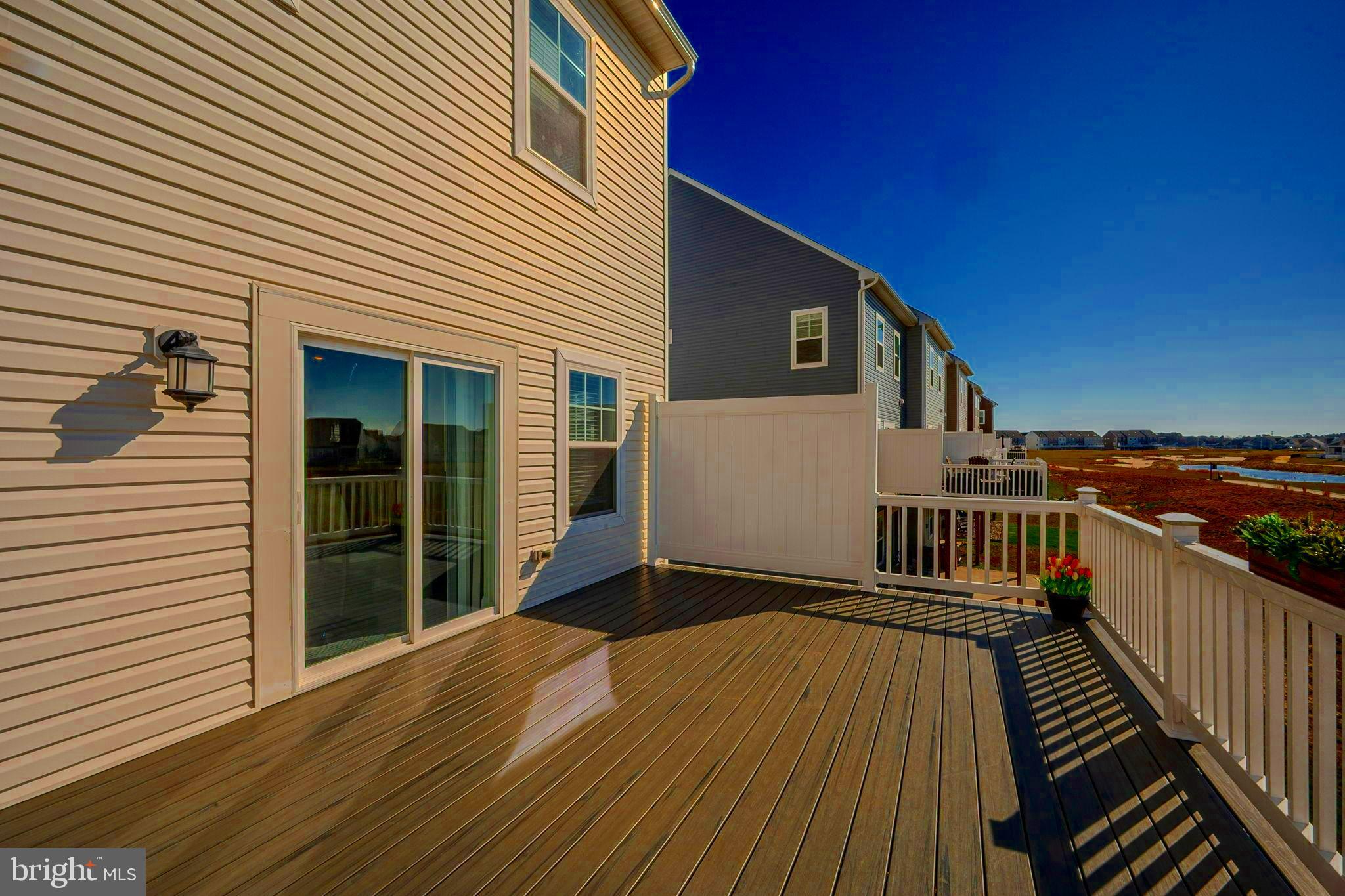 35262 Wright Way Millsboro, DE 19966 - Photo 18 of 42 a view of a house with wooden deck