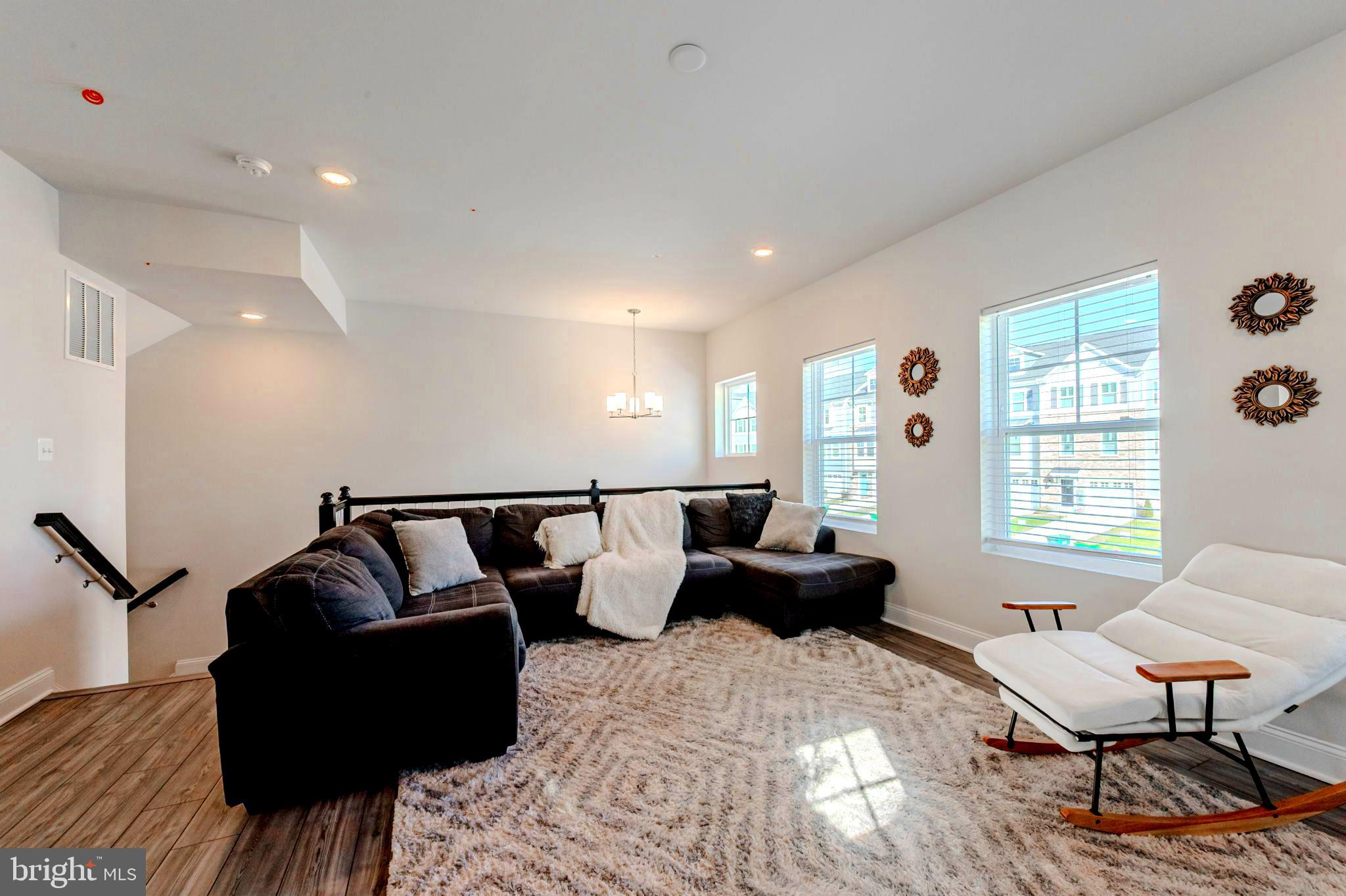 35262 Wright Way Millsboro, DE 19966 - Photo 2 of 42 a living room with furniture and wooden floor