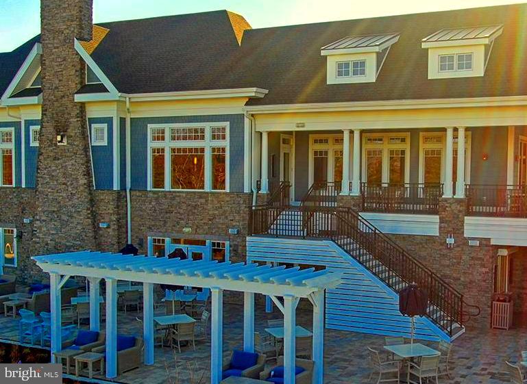 35262 Wright Way Millsboro, DE 19966 - Photo 33 of 42 a front view of a house with a yard