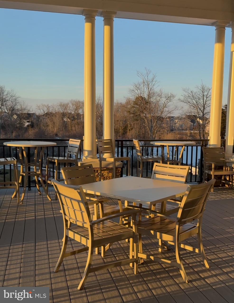 35262 Wright Way Millsboro, DE 19966 - Photo 34 of 42 a view of a patio with dining table and chairs