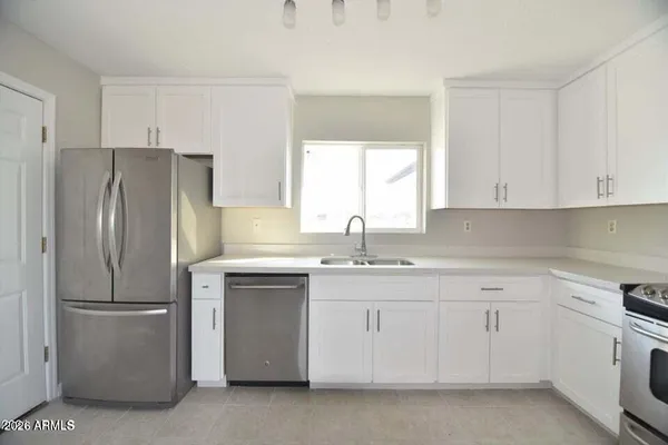 a view of an empty room and closet