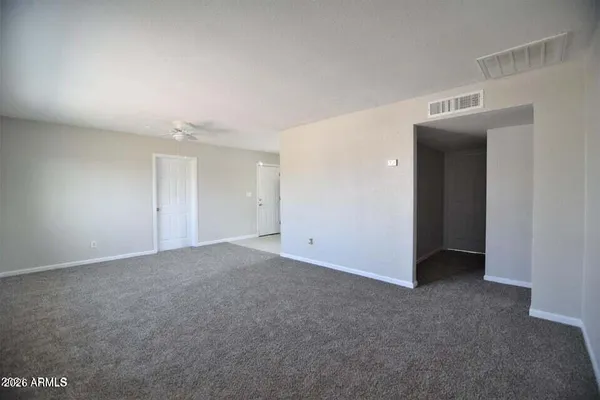 a bathroom with a toilet a sink a mirror a bathtub and shower