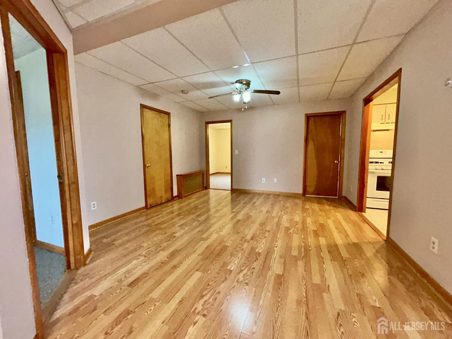54 Loring Avenue, Unit 1 Edison, NJ 08817 - Photo 8 of 16 a view of an empty room with a window