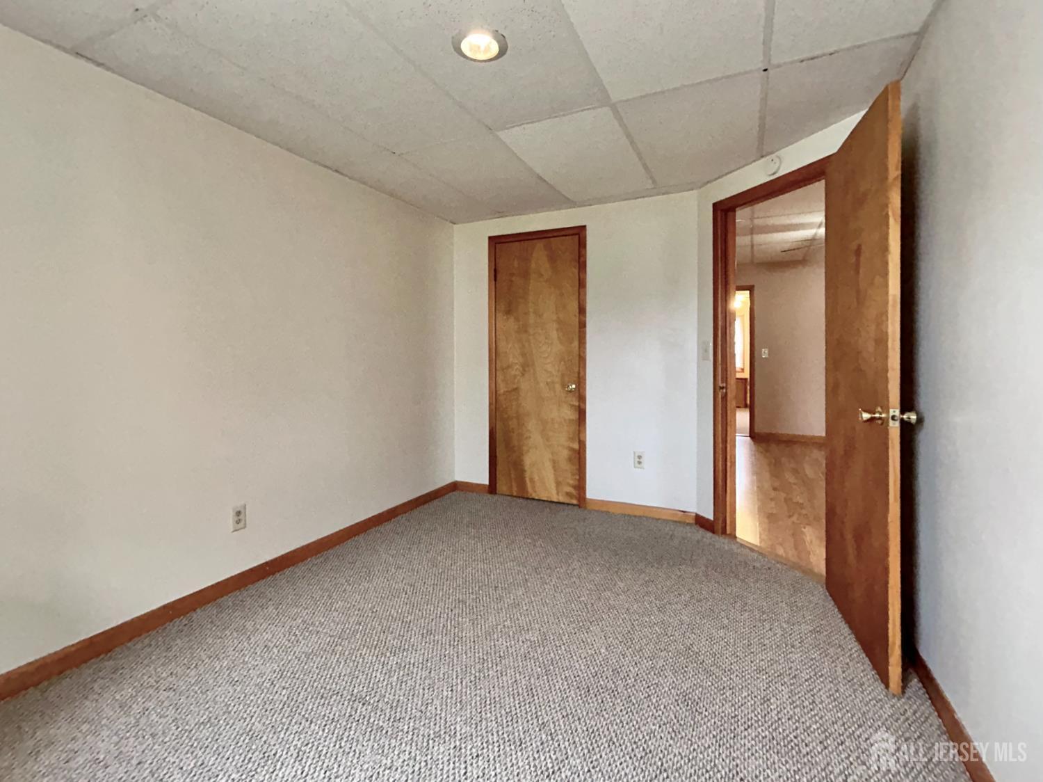 54 Loring Avenue, Unit 1 Edison, NJ 08817 - Photo 9 of 16 a view of an empty room