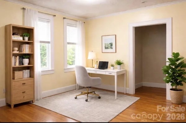 a workspace with furniture and window