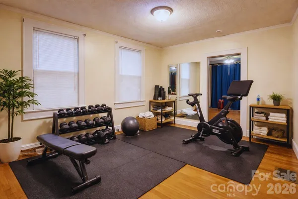 a room with furniture and wooden floor