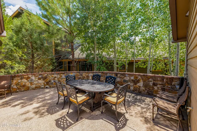 a view of outdoor sitting area with furniture