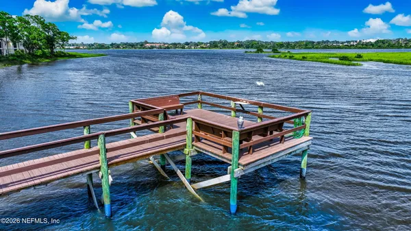 a view of a bench in a backyard