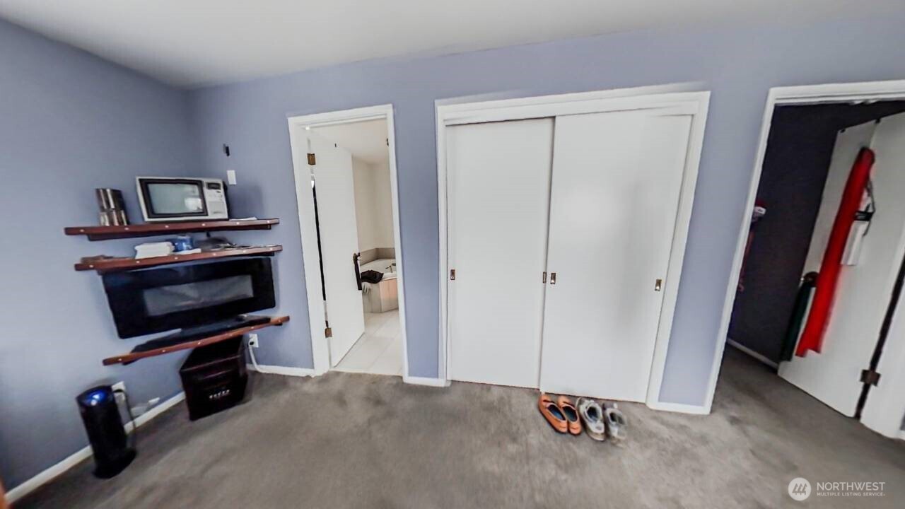283 Division Avenue Morton, WA 98356 - Photo 9 of 12 a view of a livingroom with a flat screen tv