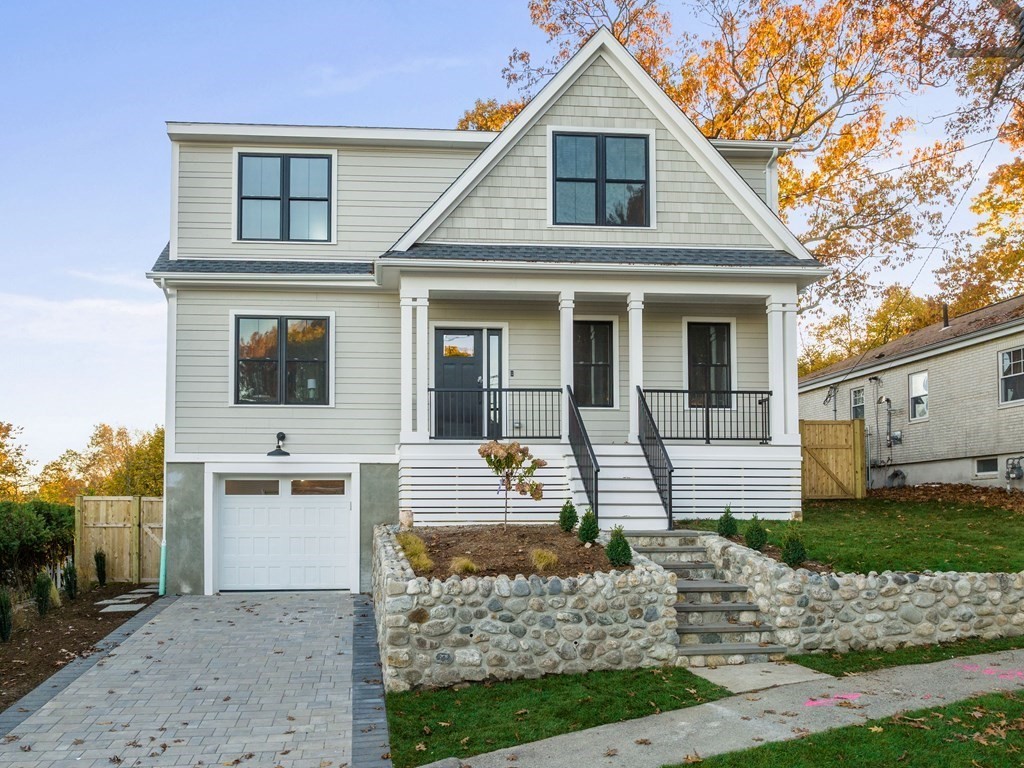 30 Westvale Road Medford, MA 02155 - Photo 1 of 35 a front view of a house with a yard