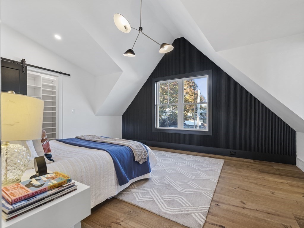 30 Westvale Road Medford, MA 02155 - Photo 17 of 35 a bedroom with a bed and a window