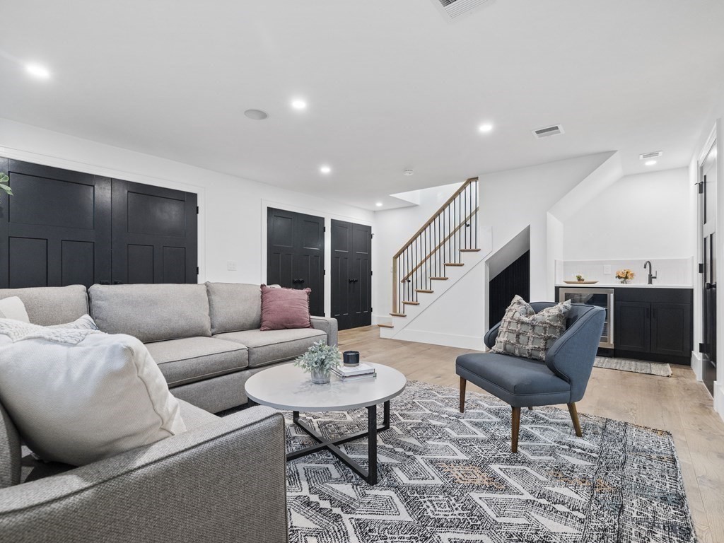 30 Westvale Road Medford, MA 02155 - Photo 21 of 35 a living room with furniture and a table