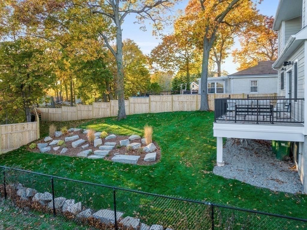 30 Westvale Road Medford, MA 02155 - Photo 28 of 35 a view of a backyard with plants and a garden