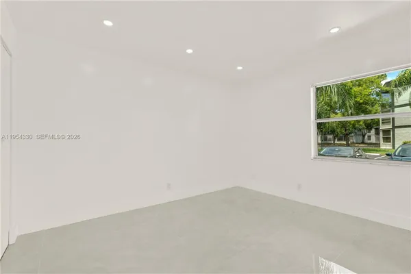 an empty room with a window