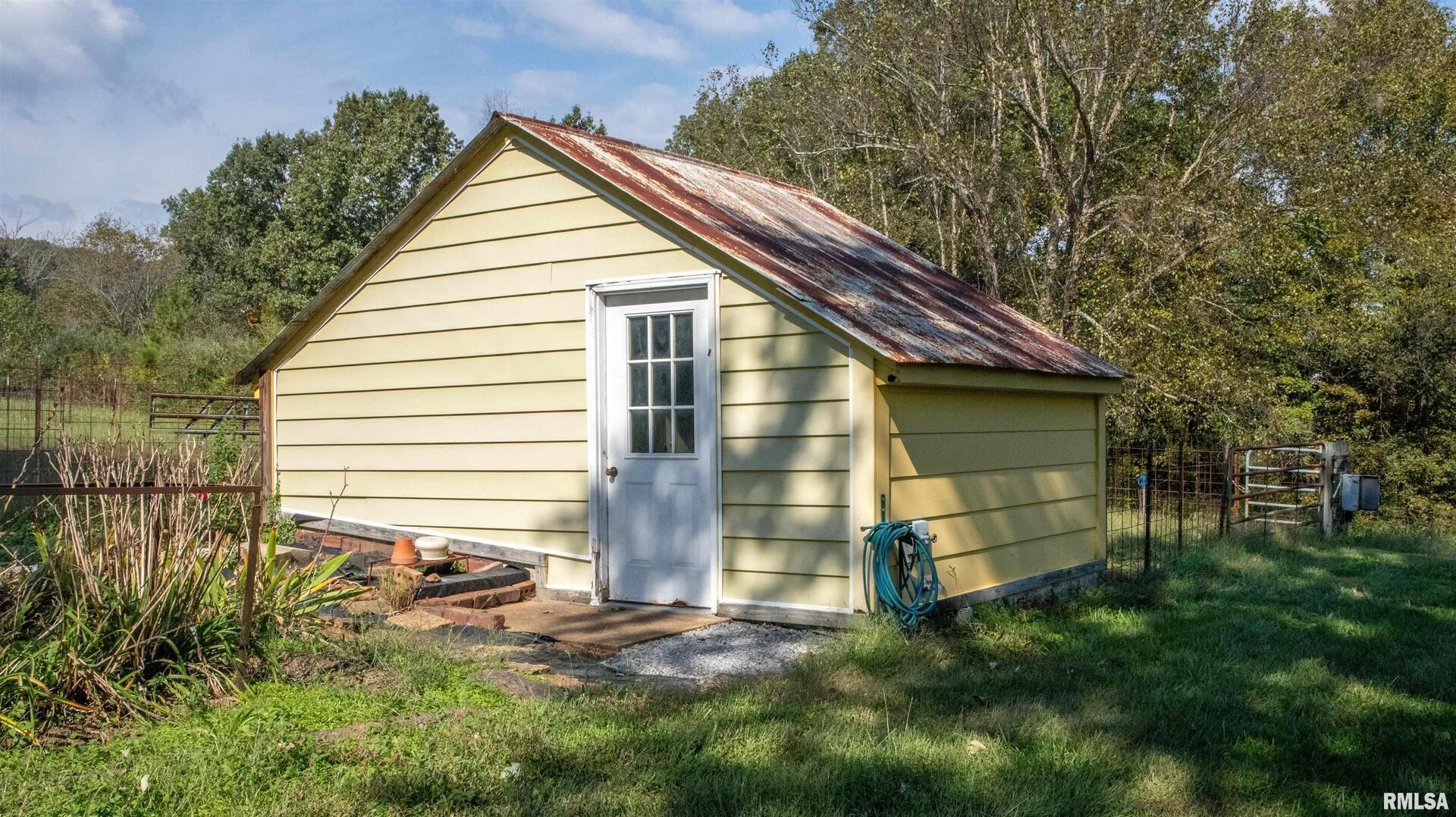 2680 Highway 45 Vienna, IL 62995 - Photo 18 of 20 a house view with a outdoor space