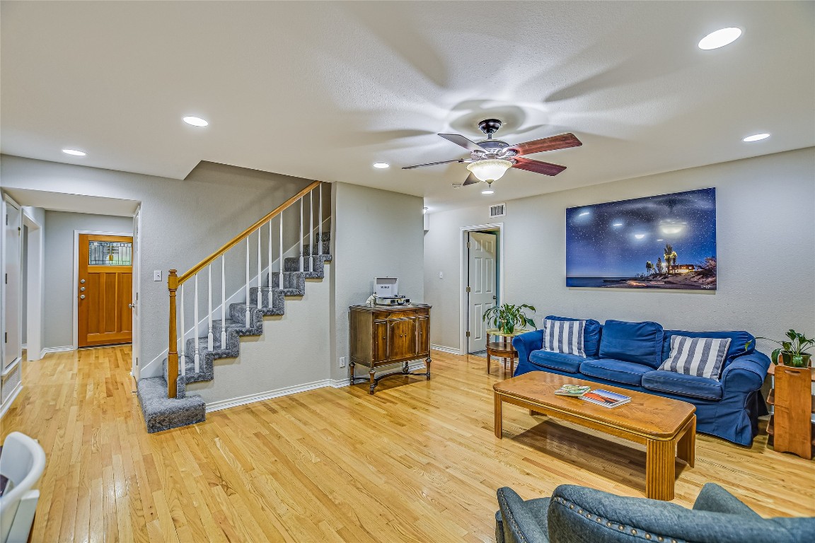 7615 Rockpoint Drive Austin, TX 78731 - Photo 15 of 30 a living room with furniture and a wooden floor