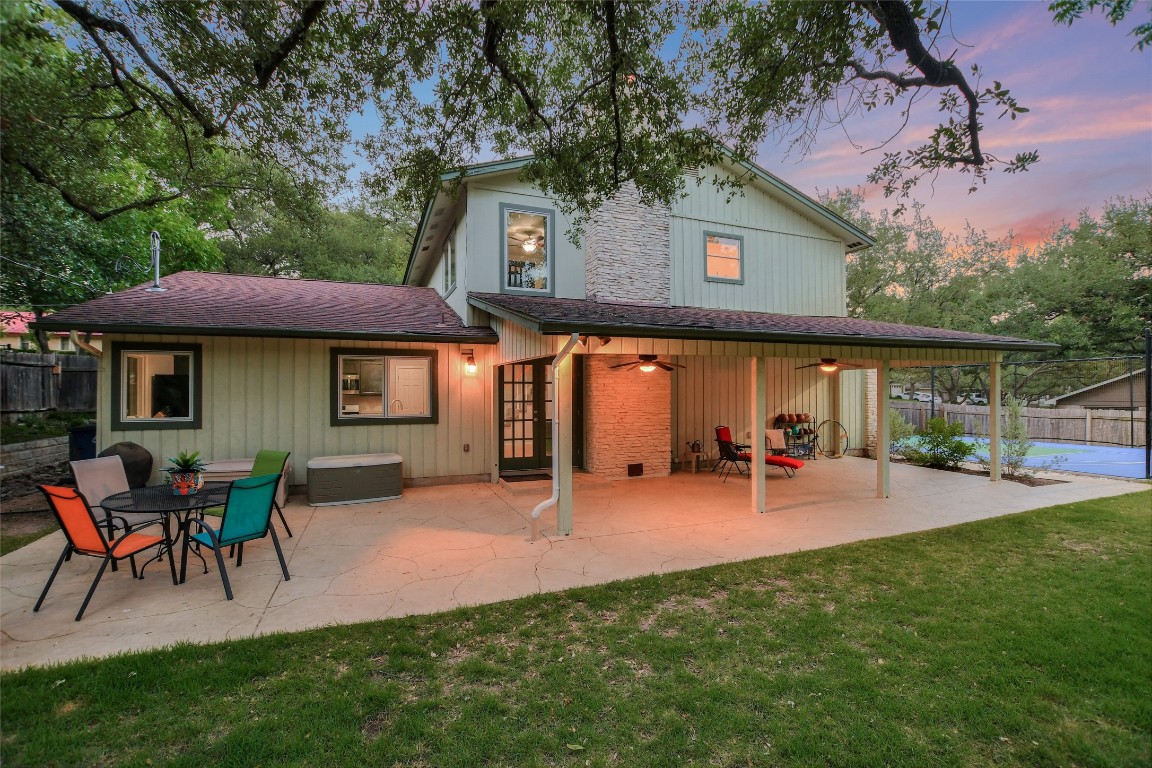 7615 Rockpoint Drive Austin, TX 78731 - Photo 2 of 30 a view of a house with backyard porch and sitting area
