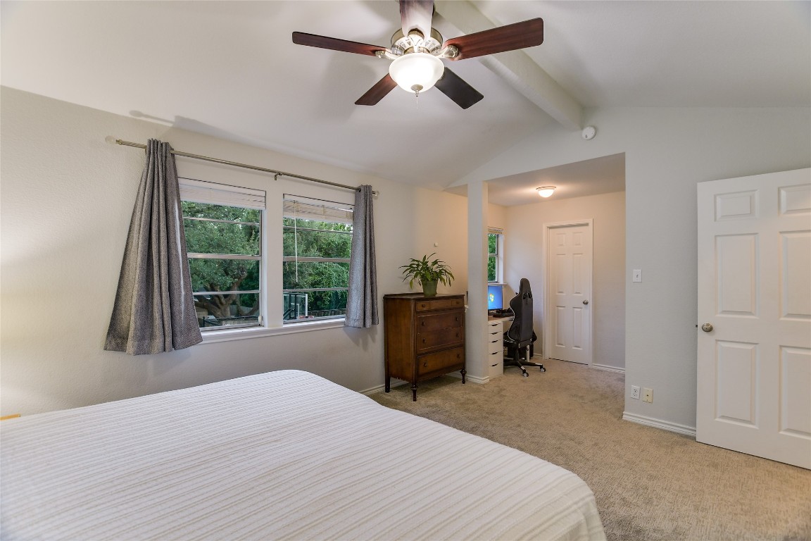 7615 Rockpoint Drive Austin, TX 78731 - Photo 24 of 30 a bedroom with a bed and a large window