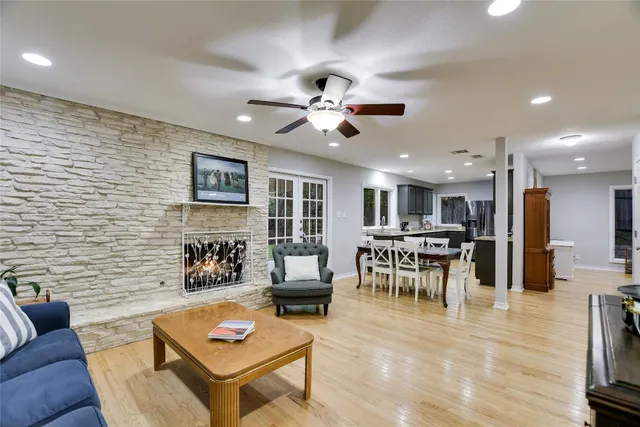 a living room with furniture and a table