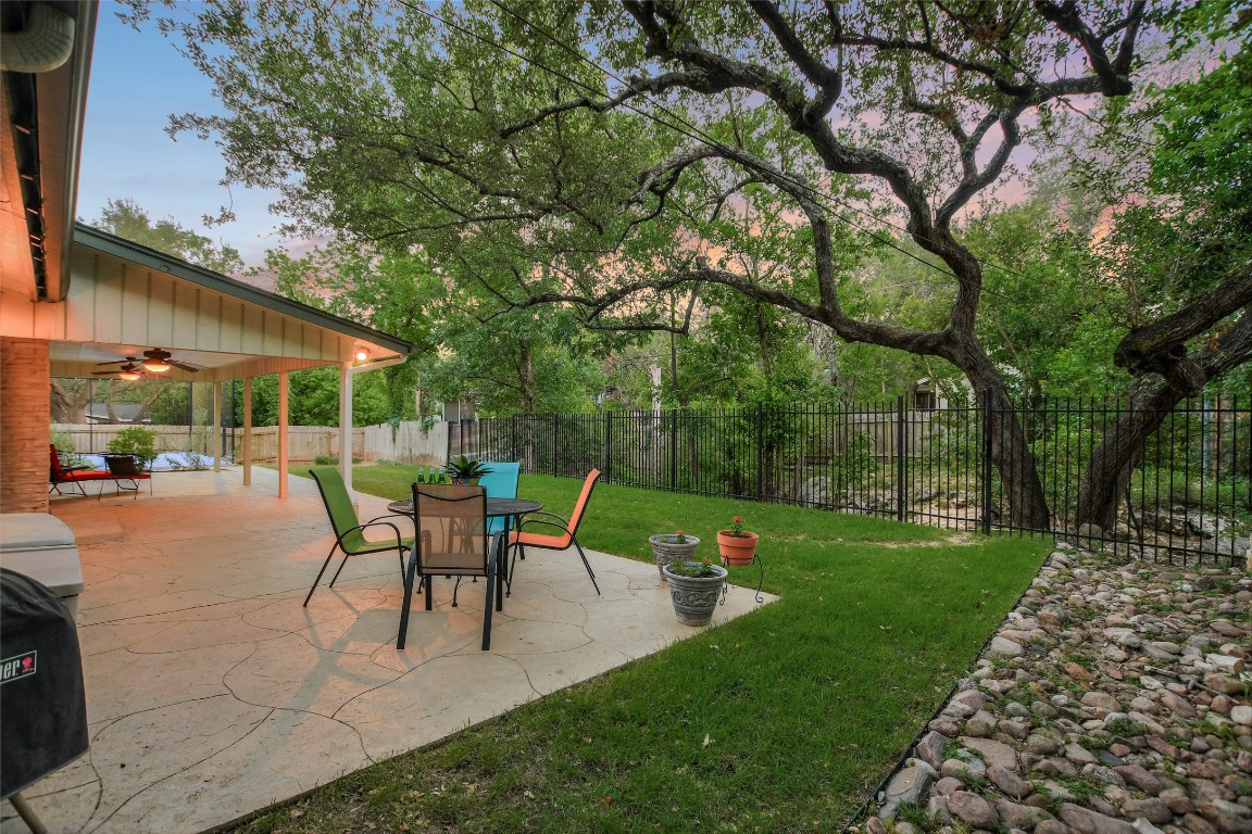 7615 Rockpoint Drive Austin, TX 78731 - Photo 8 of 30 a view of a backyard with sitting area