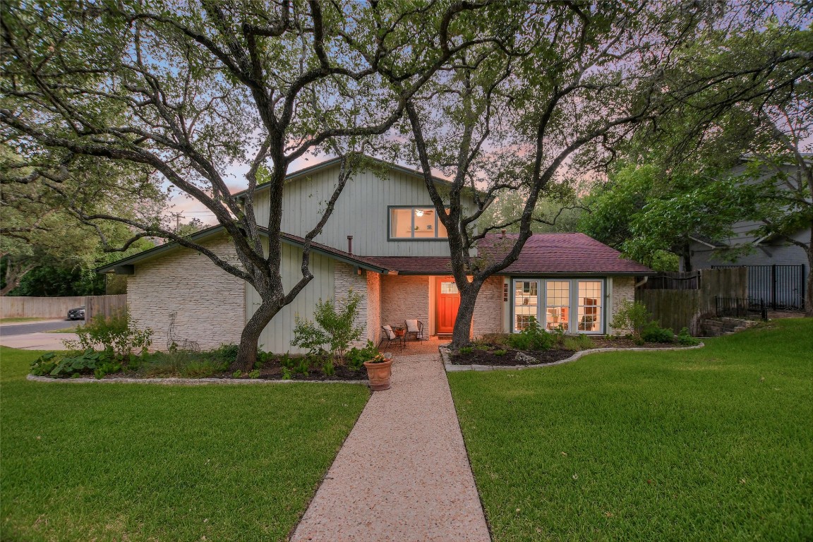 7615 Rockpoint Drive Austin, TX 78731 - Photo 9 of 30 a front view of house with yard and green space