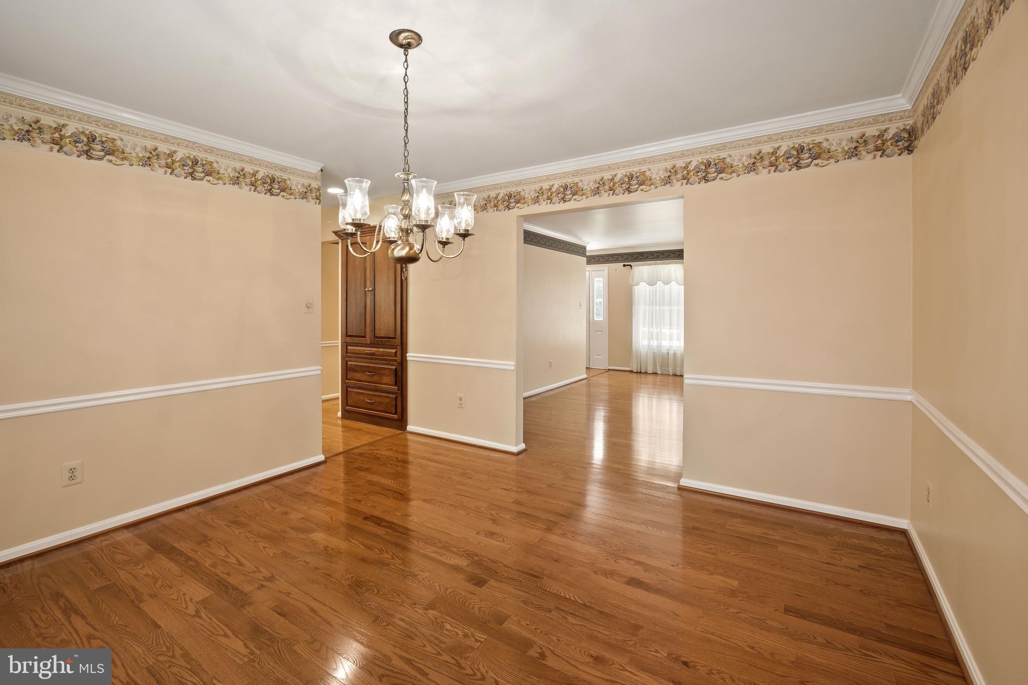 116 Summit Hall Road Gaithersburg, MD 20877 - Photo 7 of 36 Elegant formal dining room w/crown & chair molding