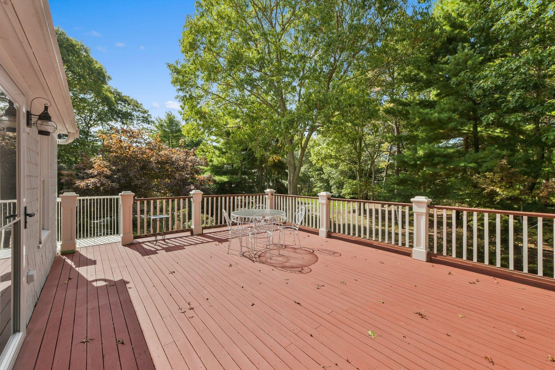 65 Tracey Road Cotuit, MA 02635 - Photo 21 of 36 a view of balcony with wooden floor and fence