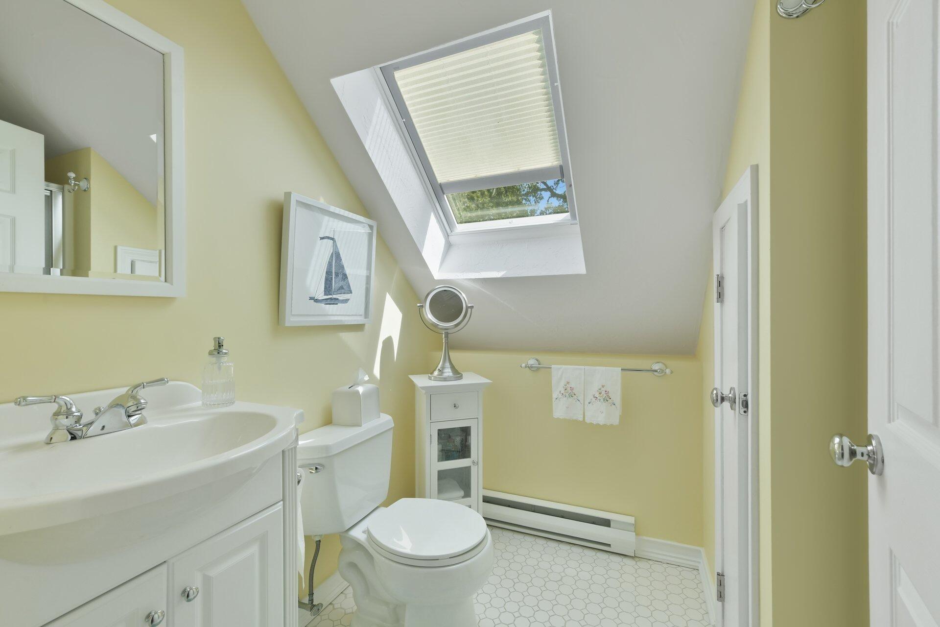 65 Tracey Road Cotuit, MA 02635 - Photo 22 of 36 a bathroom with a sink toilet and vanity