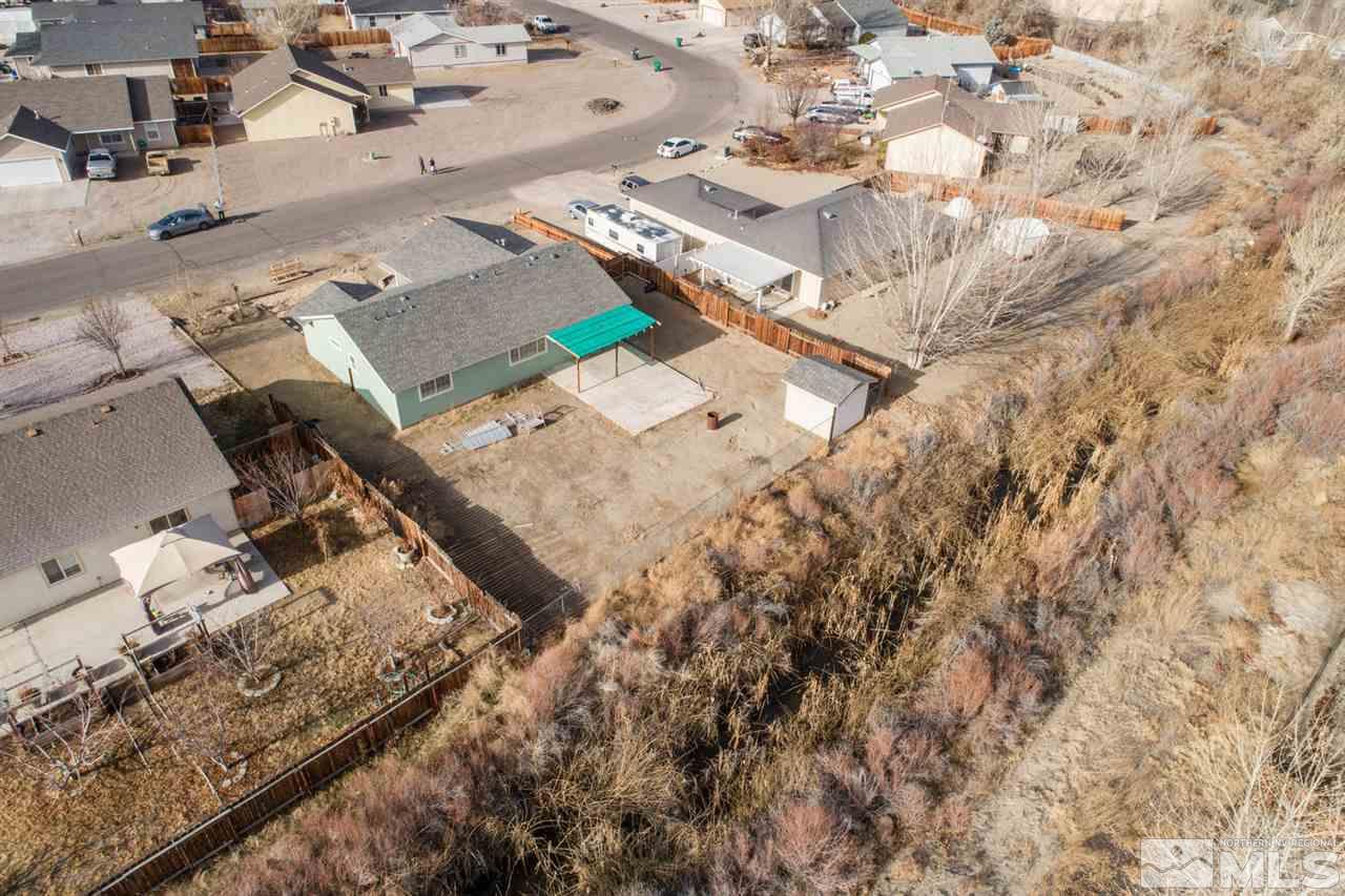 1220 Lattin Road Fallon, NV 89406 - Photo 21 of 25 an aerial view of a house with a yard
