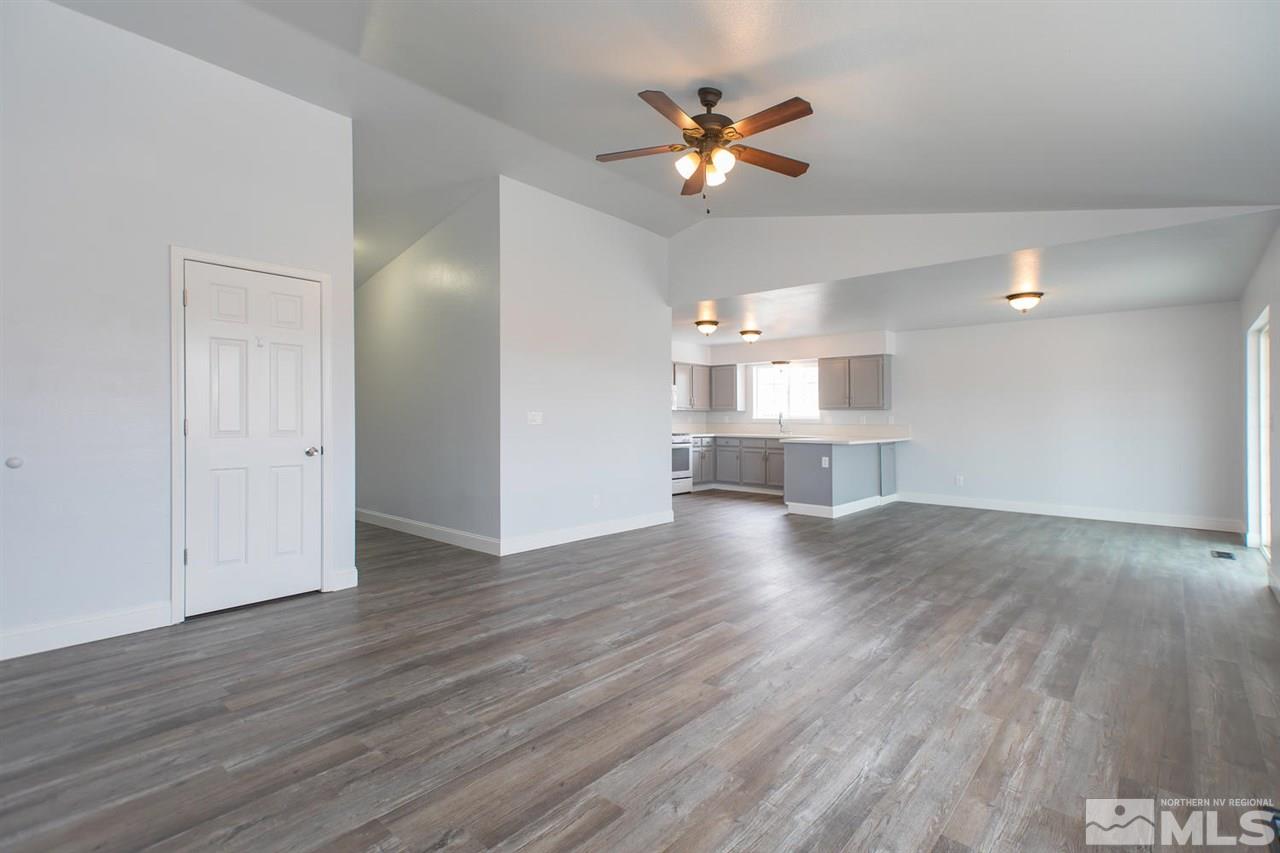 1220 Lattin Road Fallon, NV 89406 - Photo 3 of 25 a view of a kitchen with a sink and a stove top oven