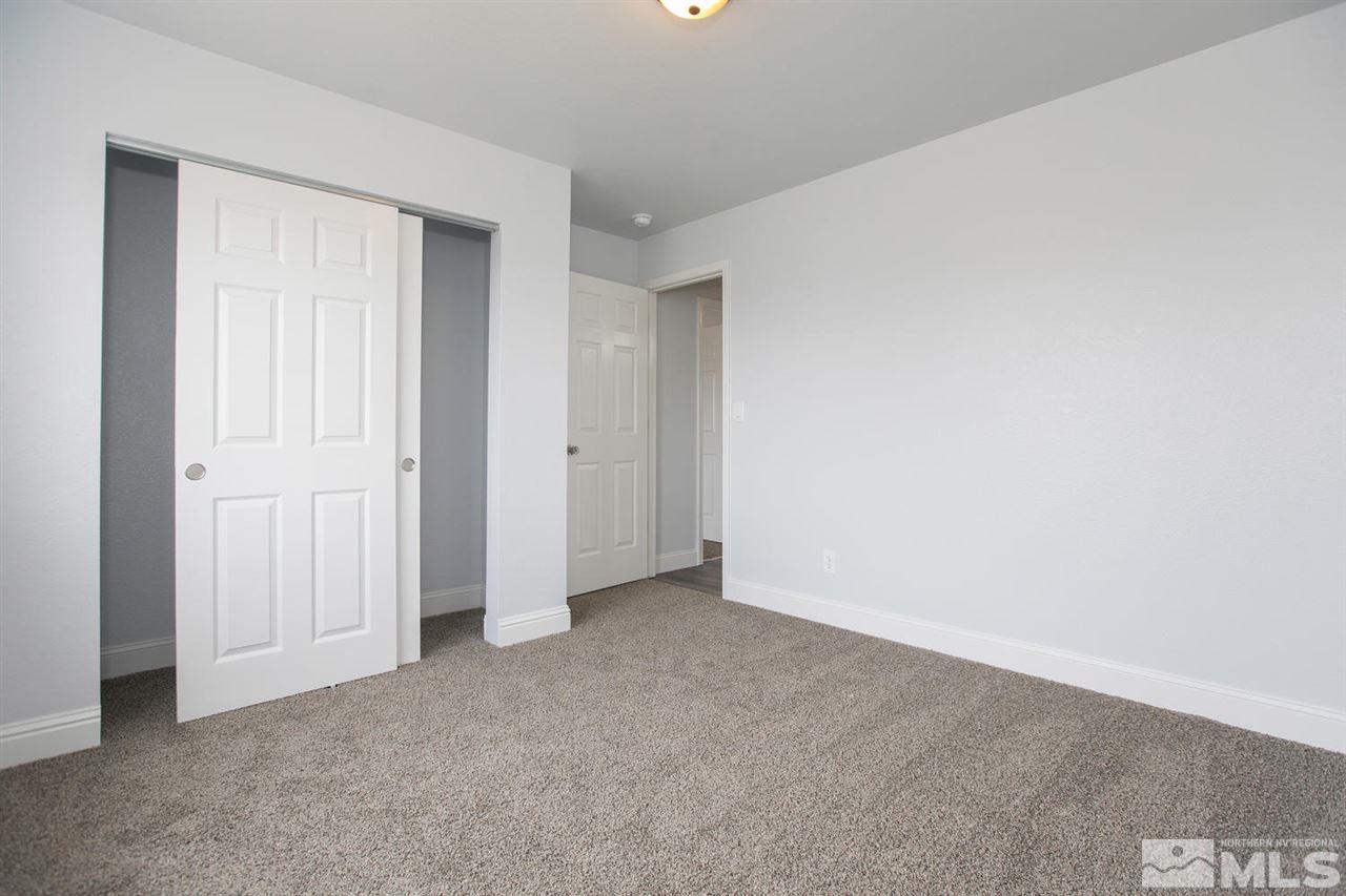 1220 Lattin Road Fallon, NV 89406 - Photo 9 of 25 an empty room with closet area