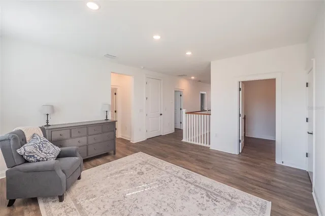 a bathroom with a sink toilet and a mirror