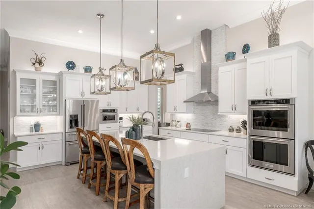 a patio with a patio table and chairs