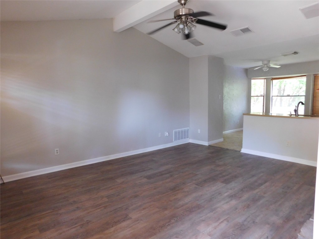 Undisclosed Address Austin, TX 78754 - Photo 9 of 18 a view of an empty room with wooden floor and a window