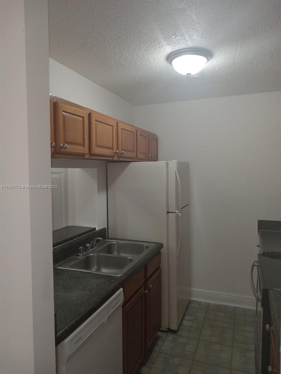 4401 West McNab Road, Unit 13 Pompano Beach, FL 33069 - Photo 25 of 27 Gallery Image 25