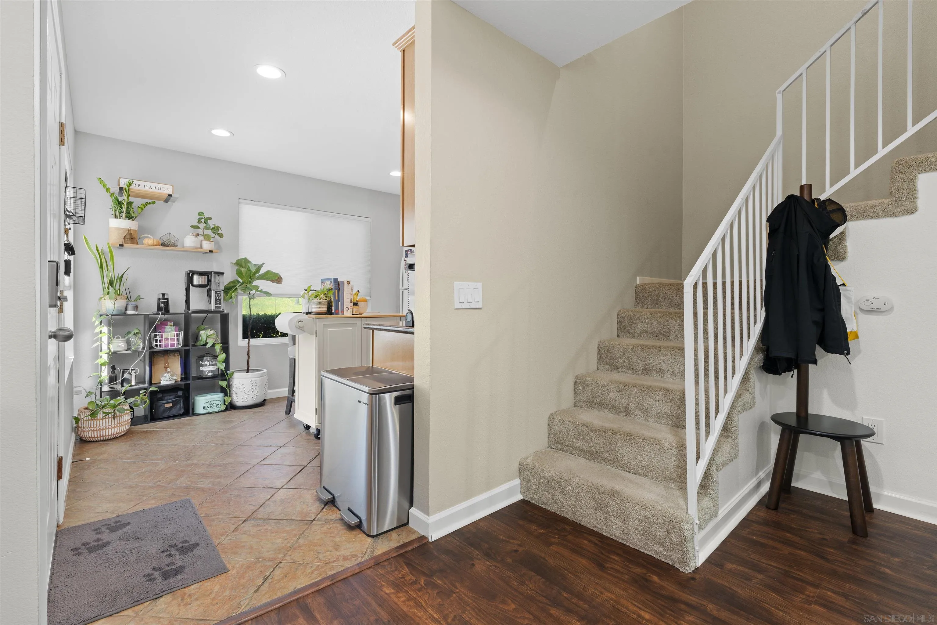 6333 College Grove Way, Unit 1101 (14) San Diego, CA 92115 - Photo 21 of 39 a view of entryway and hall with wooden floor