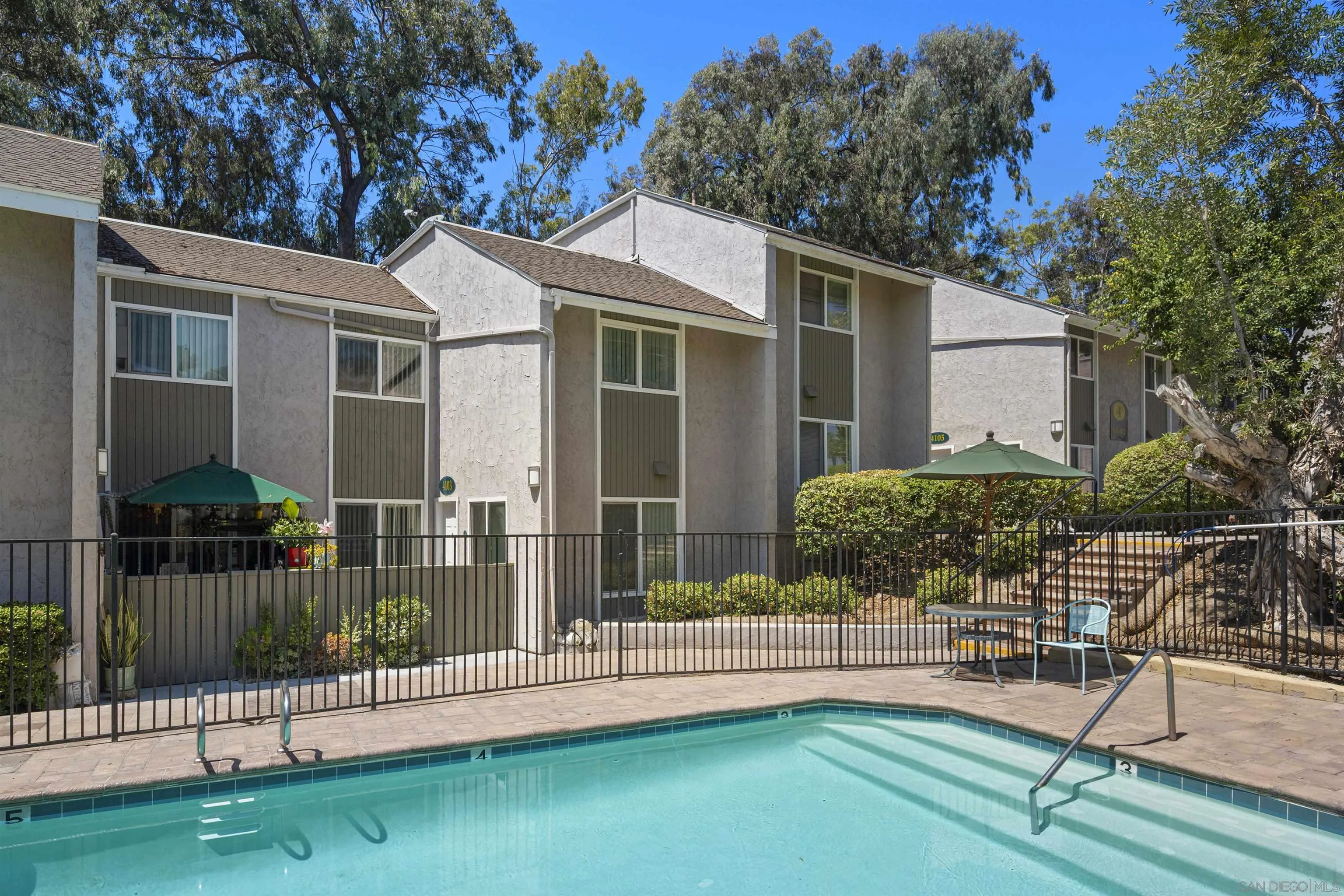 6333 College Grove Way, Unit 1101 (14) San Diego, CA 92115 - Photo 37 of 39 a view of a house with backyard and sitting area