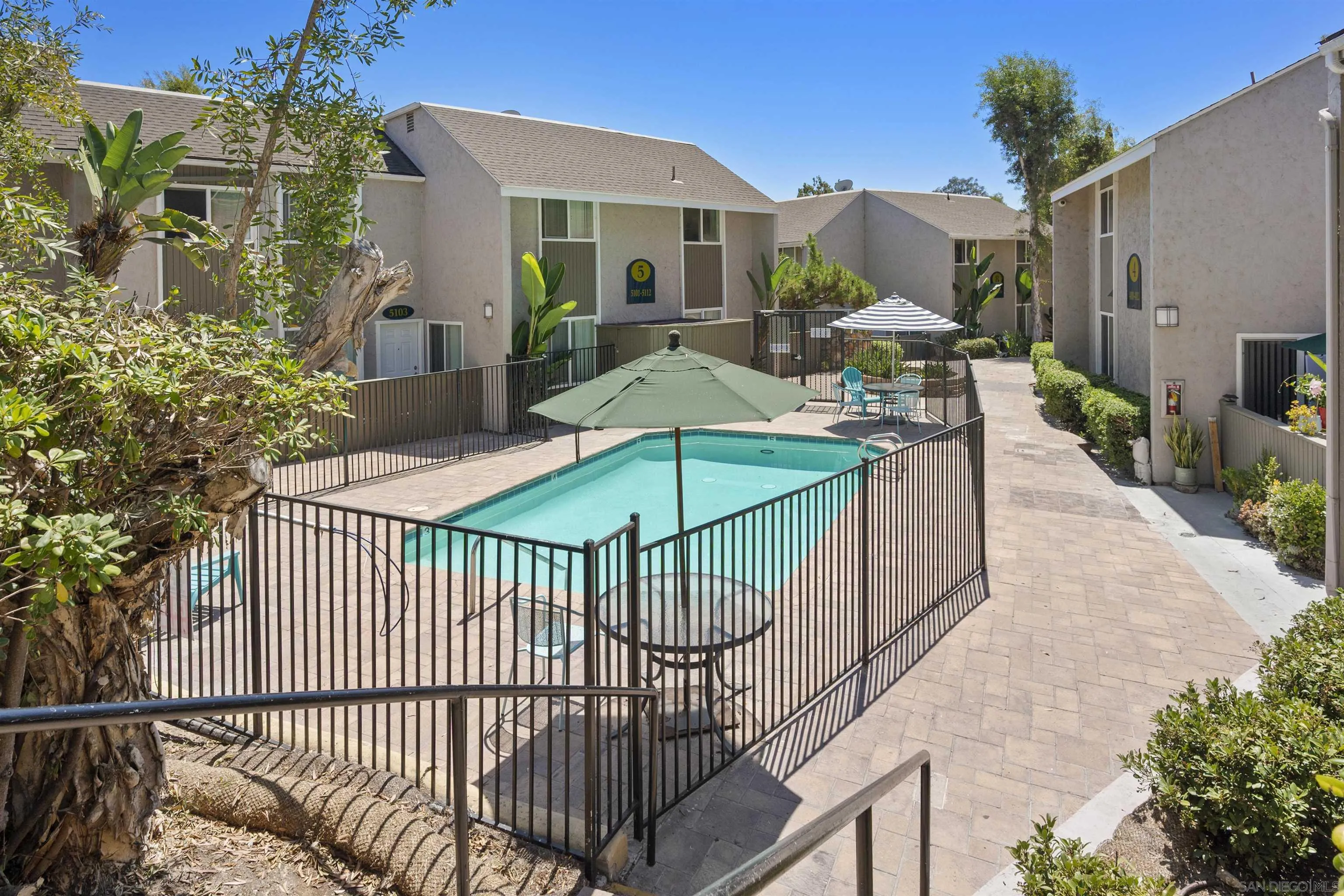 6333 College Grove Way, Unit 1101 (14) San Diego, CA 92115 - Photo 38 of 39 a view of a house with backyard and sitting area