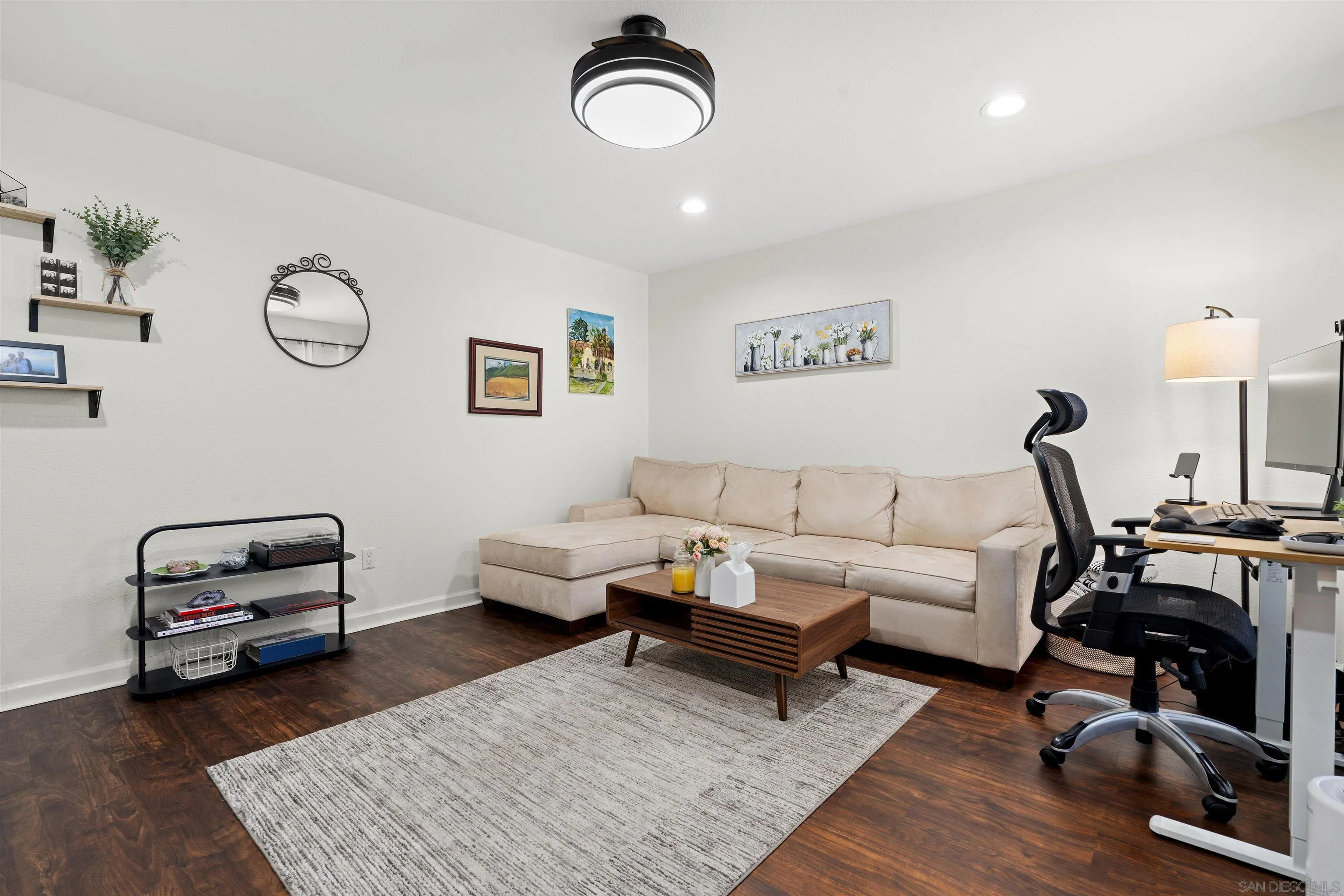 6333 College Grove Way, Unit 1101 (14) San Diego, CA 92115 - Photo 7 of 39 a living room with furniture and a wooden floor