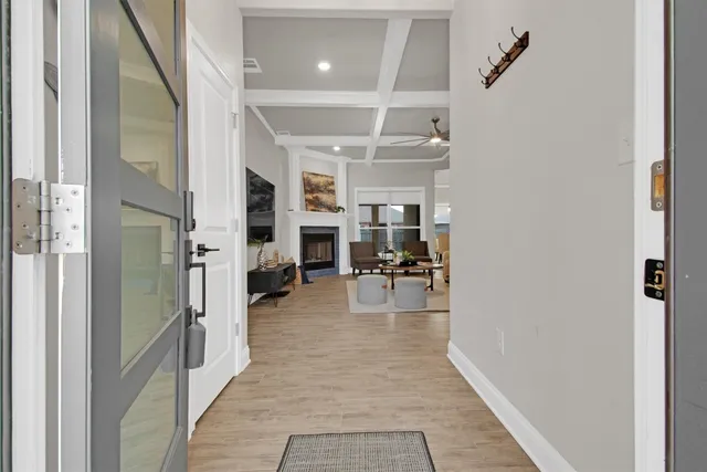 a view of livingroom with furniture and a ceiling fan