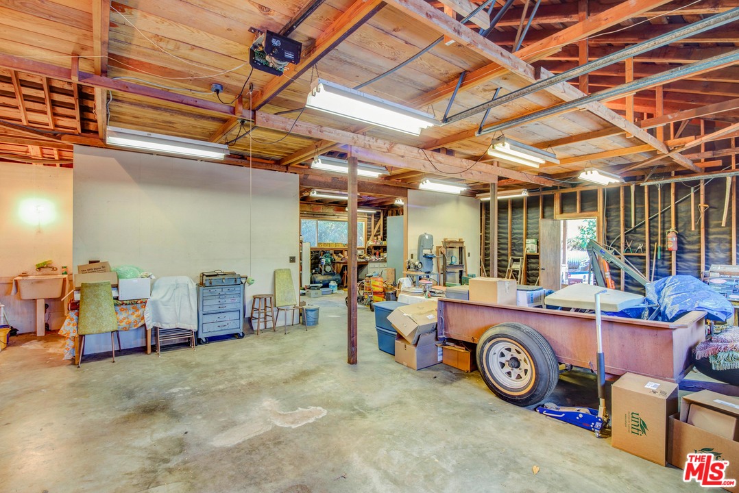 20490 Seaboard Road Malibu, CA 90265 - Photo 15 of 43 a utility room with furniture